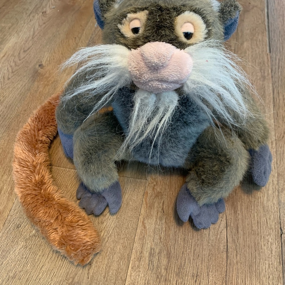 Plush Monkey Toy with Orange Tail